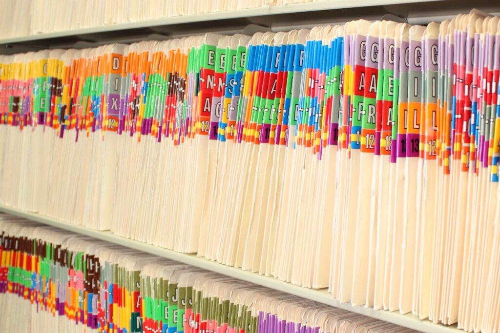 paper medical records in a cabinet