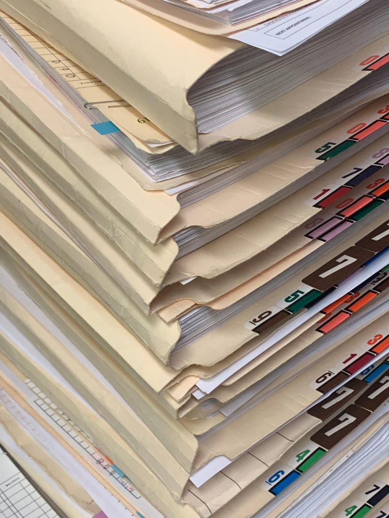 stack of paper medical records